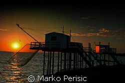 Fishing huts on the West Coast of France. by Marko Perisic 